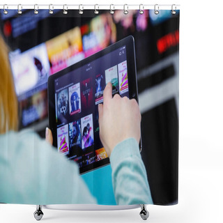 Personality  Woman Holding A Touch Pad And Switching Channels On France Netflix HomePage. With TV Set On Background. Shower Curtains