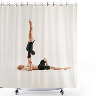 Personality  A Shirtless Young Man And A Woman Performing Acrobatic Handstands In Perfect Synchrony Against A White Studio Backdrop. Shower Curtains