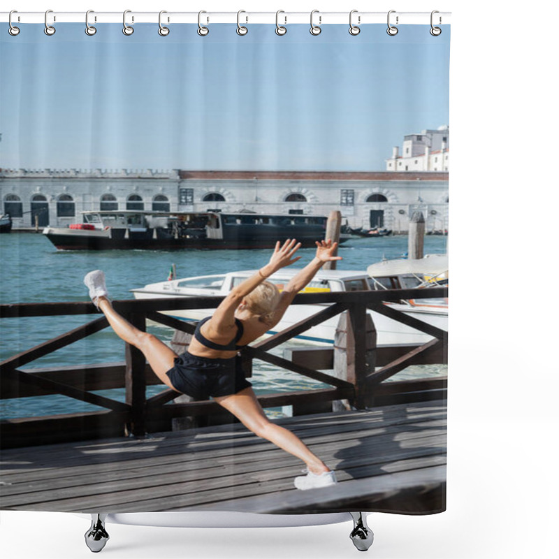 Personality  Blonde Sportswoman In White Sneakers, Black Crop Top And Shorts Stretching While Training On Pier In Venice  Shower Curtains