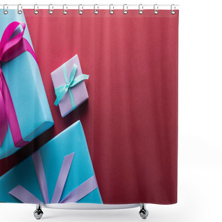 Personality  Top View Of Blue And Violet Gift Boxes With Ribbons On Red Background With Copy Space Shower Curtains