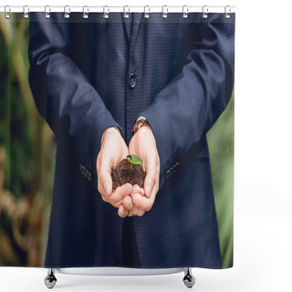 Personality  Partial View Of Businessman In Suit Holding Green Sprout And Ground In Hands In Orangery Shower Curtains