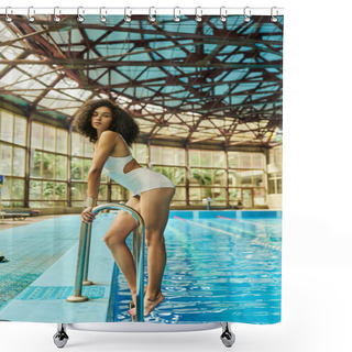 Personality  Young And Curly African American Woman In Bathing Suit Standing By Pool Ladder With Blue Water Shower Curtains