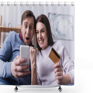 Personality  Excited Couple With Credit Card Using Smartphone On Blurred Foreground  Shower Curtains