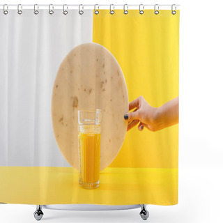 Personality  Cropped View Of Woman Holding Marble Circle Near Glass Of Fresh Delicious Yellow Smoothie On Grey And Yellow Background Shower Curtains