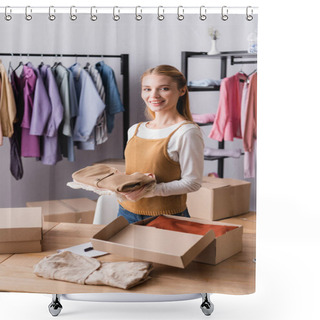 Personality  Happy Businesswoman Holding Clothes In Showroom Near Hangers On Blurred Background Shower Curtains