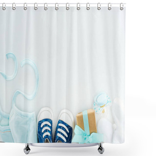 Personality  Top View Of Booties And Sneakers, Pacifier, Gift Box And Bonnet On White Background Shower Curtains