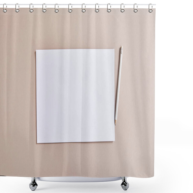 Personality  top view of blank white paper with pencil on beige surface shower curtains