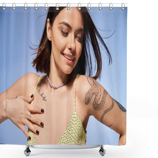 Personality  A Young Woman With Brunette Hair Proudly Showing Off A Tattoo On Her Arm In A Studio Setting. Shower Curtains