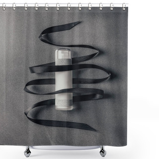 Personality  View From Above Of Lotion And Black Ribbon On Silver Shower Curtains