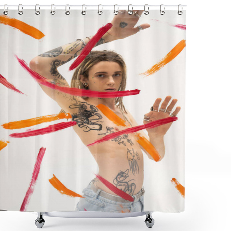 Personality  Queer Person With Tattooed Body And Dreadlocks Looking At Camera Near Glass With Brush Strokes On White Background Shower Curtains