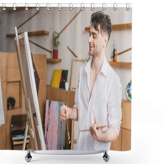 Personality  Selective Focus Of Smiling Artist In White Shirt And Blue Jeans Looking At Canvas Shower Curtains