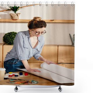 Personality  Stylish Female Artist In Eyeglasses Rolling Canvas On Table With Painting Supplies  Shower Curtains
