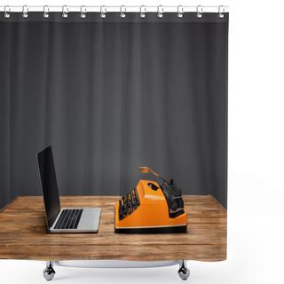 Personality  Laptop With Blank Screen Near Typewriter On Wooden Desk Isolated On Grey Shower Curtains