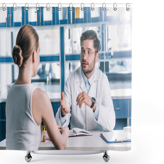 Personality  Selective Focus Of Handsome Doctor In Glasses Looking At Patient And Gesturing In Clinic  Shower Curtains