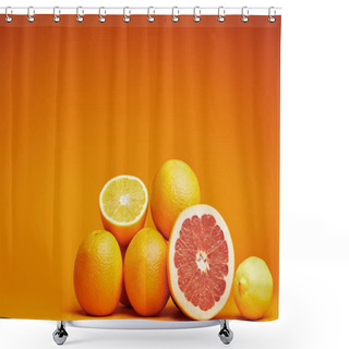 Personality  Close-up View Of Fresh Ripe Whole And Sliced Citrus Fruits On Orange Background Shower Curtains