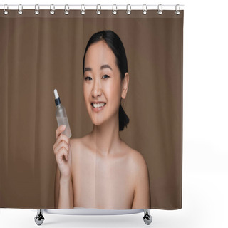 Personality  Positive Asian Woman With Naked Shoulders Holding Bottle Of Essential Oil Isolated On Brown  Shower Curtains