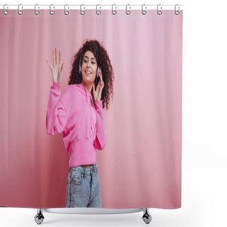 Personality  Cheerful Bi-racial Girl Waving Hand While Listening Music In Wireless Headphones On Pink Background Shower Curtains