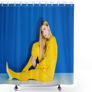 Personality  Female Fashion Model Dressed In Yellow Sitting On Floor On Blue Background Shower Curtains