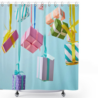 Personality  Festive Colorful Gift Boxes Hanging On Ribbons Isolated On Blue Shower Curtains