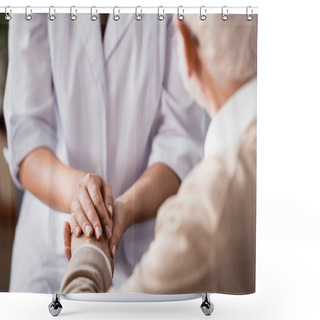 Personality  Cropped View Of Social Worker Holding Hands Of Aged Man On Blurred Background Shower Curtains
