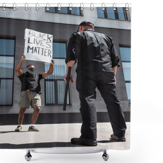 Personality  Selective Focus Of African American Man With Scarf On Face Holding Placard With Black Lives Matter Lettering Near Policeman With Baton On Street, Racism Concept  Shower Curtains