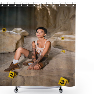 Personality  Full Length Of Sexy And Thoughtful Archaeologist Sitting Near Numbered Marks In Cave Shower Curtains