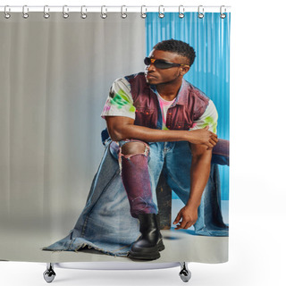 Personality  Confident Afroamerican Man In Sunglasses, Denim Vest And Trendy Ripped Jeans Sitting On Stone On Grey With Blue Polycarbonate Sheet At Background, Sustainable Fashion, DIY Clothing Shower Curtains