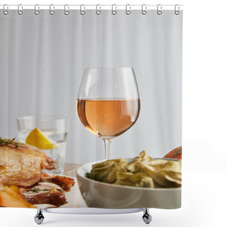 Personality  Selective Focus Of Glass With Rose Wine Near Grilled Turkey And Backed Physalis Isolated On Grey Shower Curtains