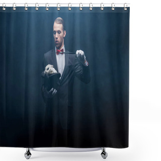 Personality  Emotional Magician In Suit Showing Trick With Wand And White Bunny In Hat, Dark Room With Smoke Shower Curtains
