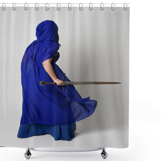 Personality  Full Length Portrait Of Beautiful Female Model Wearing Elegant Fantasy Blue Ball Gown, Flowing Cape With Hood.Standing Pose Walking Away, Holding A Sword Weapon Isolated On White Studio Background. Shower Curtains