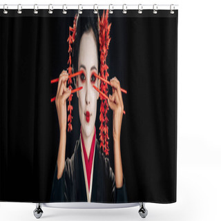 Personality  Beautiful Geisha In Black Kimono With Red Flowers In Hair Holding Chopsticks Near Eyes Isolated On Black, Panoramic Shot Shower Curtains