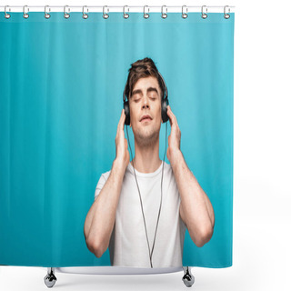 Personality  Dreamy Young Man In Headphones Listening Music With Closed Eyes On Blue Background Shower Curtains