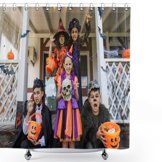 Personality  Multiethnic Friends In Halloween Costumes Holding Buckets Of Candies And Grimacing Near Decorated Cottage Shower Curtains