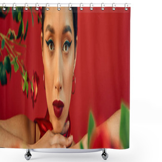 Personality  Portrait Of Youthful And Charming Asian Fashion Model With Bold Makeup And Expressive Gaze Looking At Camera Near Flowers On Red Background, Trendy Spring Concept, Banner Shower Curtains