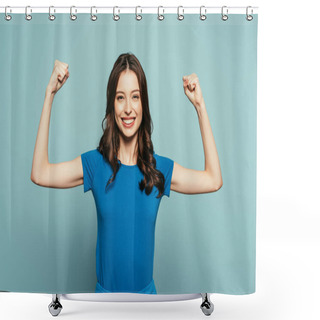 Personality  Cheerful Girl Showing Winner Gesture While Smiling At Camera On Blue Background Shower Curtains