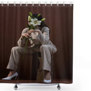Personality  Low Angle View Of Adult Model Holding Flower Near Face, Sitting On Brown Background Shower Curtains