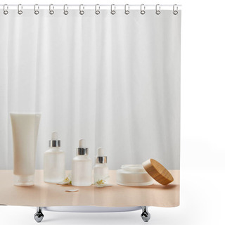 Personality  Cream Tube With Cream, Cosmetic Glass Bottles With Serum, Open Jar With Wooden Cap And Few Jasmine Flowers On Beige  Shower Curtains