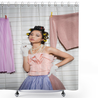 Personality  Asian Young Woman With Hair Curlers Standing In Pink Ruffled Top, Pearl Necklace And Gloves While Holding Cigarette Near Wet Laundry Hanging Near White Tiles, Housewife, Looking At Camera, Smoking  Shower Curtains