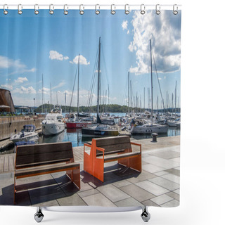 Personality  OSLO, NORWAY - 28 JULY, 2018: Empty Wooden Benches On Embankment And Moored Boats In Harbour At Aker Brygge District, Oslo   Shower Curtains