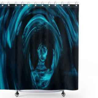Personality  Curly Man Looking At Camera Through Futuristic Neon Blue Circle On Dark Background  Shower Curtains