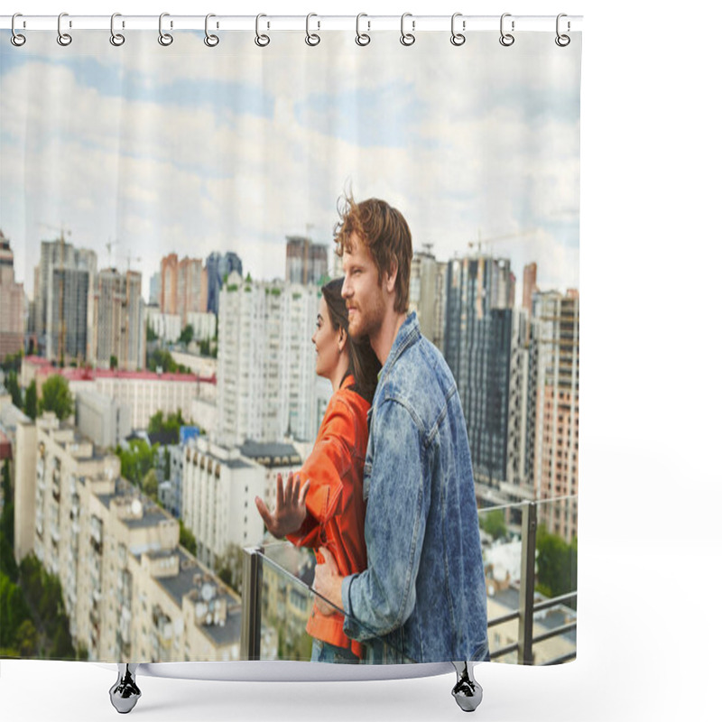 Personality  A man and woman stand on a balcony, gazing at a sprawling city below them under the night sky shower curtains