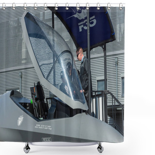 Personality  BERLIN, GERMANY - APRIL 26, 2018: Visitors Look At The Cockpit Of The Stealth Multirole Fighter Lockheed Martin F-35 Lightning II. US Air Force. Exhibition ILA Berlin Air Show 2018 Shower Curtains