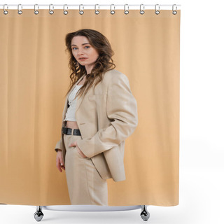 Personality  Style And Fashion Concept, Young Woman With Wavy Hair Standing In Fashionable Suit While Posing On Beige Background, Formal Attire, Hand In Pocket, Looking At Camera, Modern Elegance  Shower Curtains
