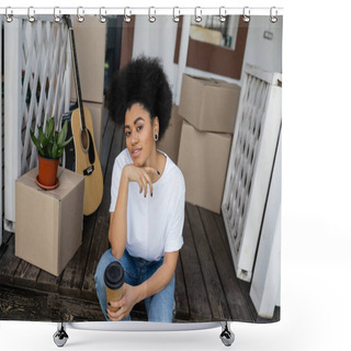Personality  Smiling African American Woman Holding Coffee To Go And Sitting Near Carton Boxes And New House Shower Curtains