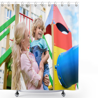 Personality  Low Angle View Of Happy Mother Holding On Hands Smiling Little Son At Playground  Shower Curtains