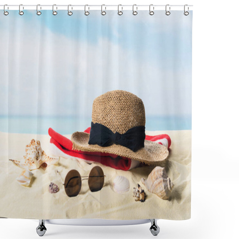 Personality  Straw hat and sunglasses with seashells in sand on blue sky background shower curtains