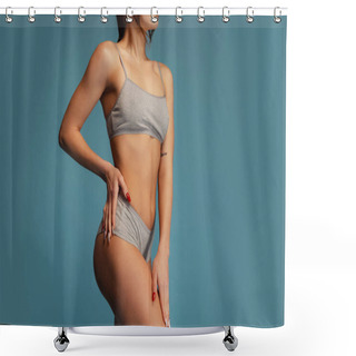 Personality  Cropped Studio Shot Of Slim, Sportive Female Body In Gray Cotton Underwear Posing Isolated Over Blue Background. Fitness Concept Shower Curtains