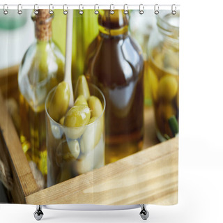 Personality  Close Up View Of Glass With Spoon And Green Olives, Jar, Various Bottles Of Aromatic Olive Oil On Wooden Tray Shower Curtains