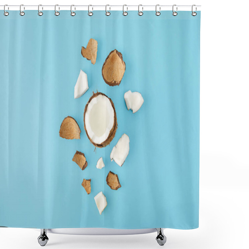 Personality  top view of arranged coconut pieces isolated on blue shower curtains