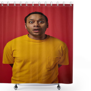 Personality  Astonished Indian Man In Yellow T-shirt Looking At Camera On Red Background, Face Expression Shower Curtains